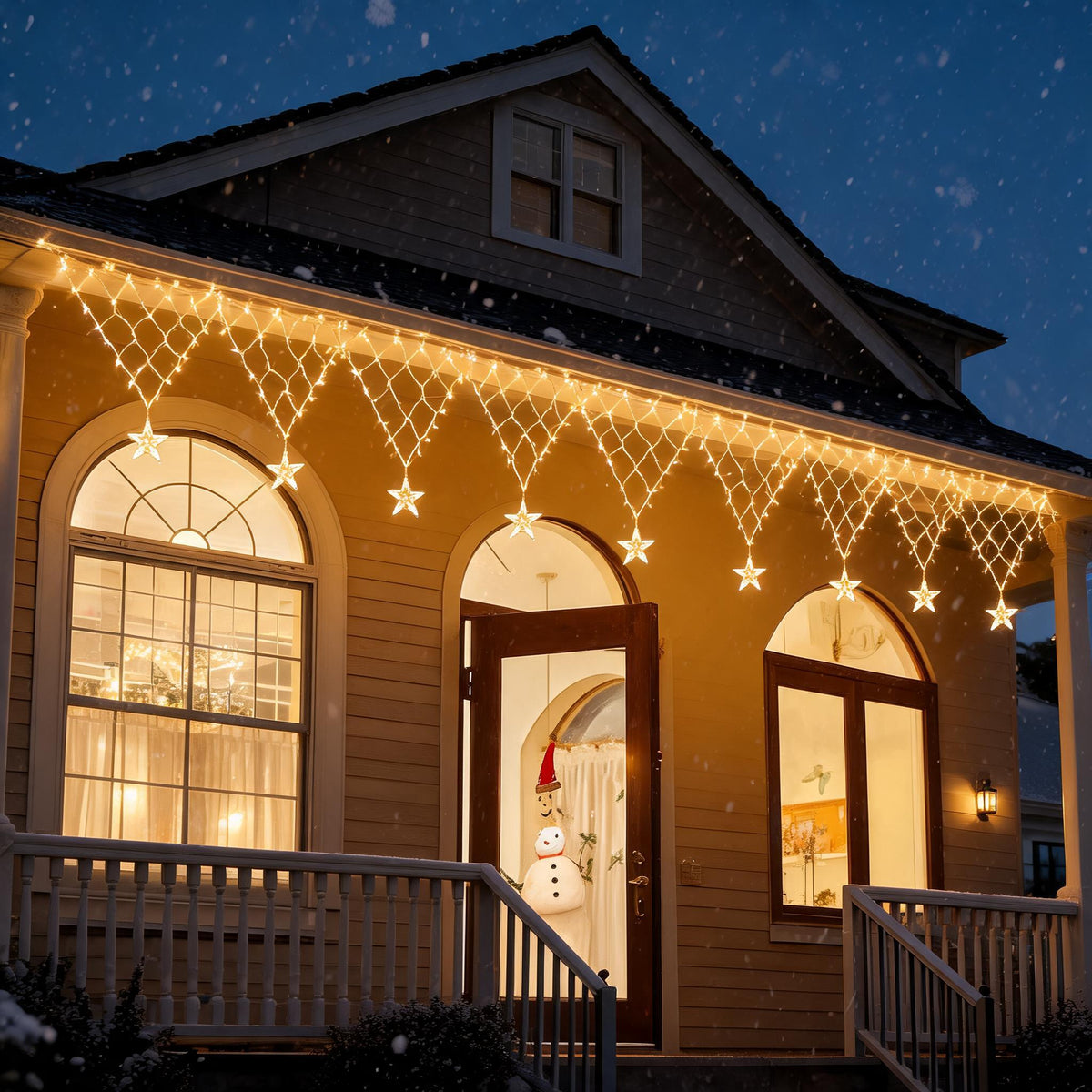 Outdoor LED net curtain lights with stars along a house roofline at night