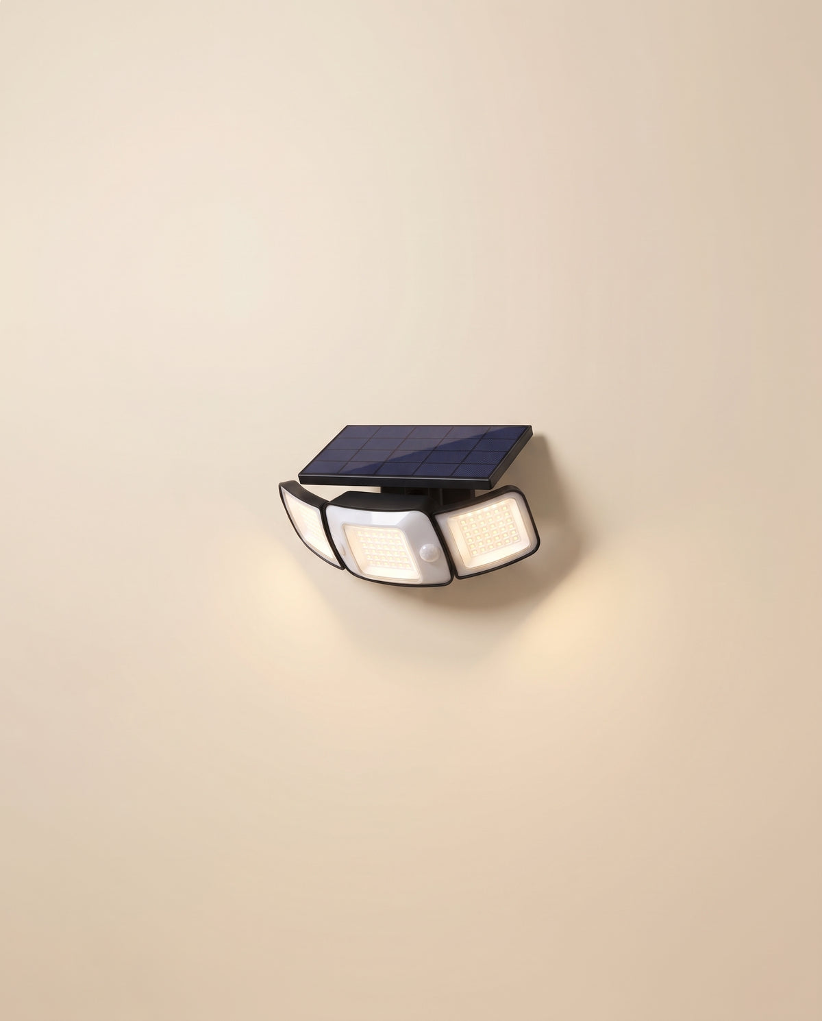 Compact solar outdoor wall washer light on a wall